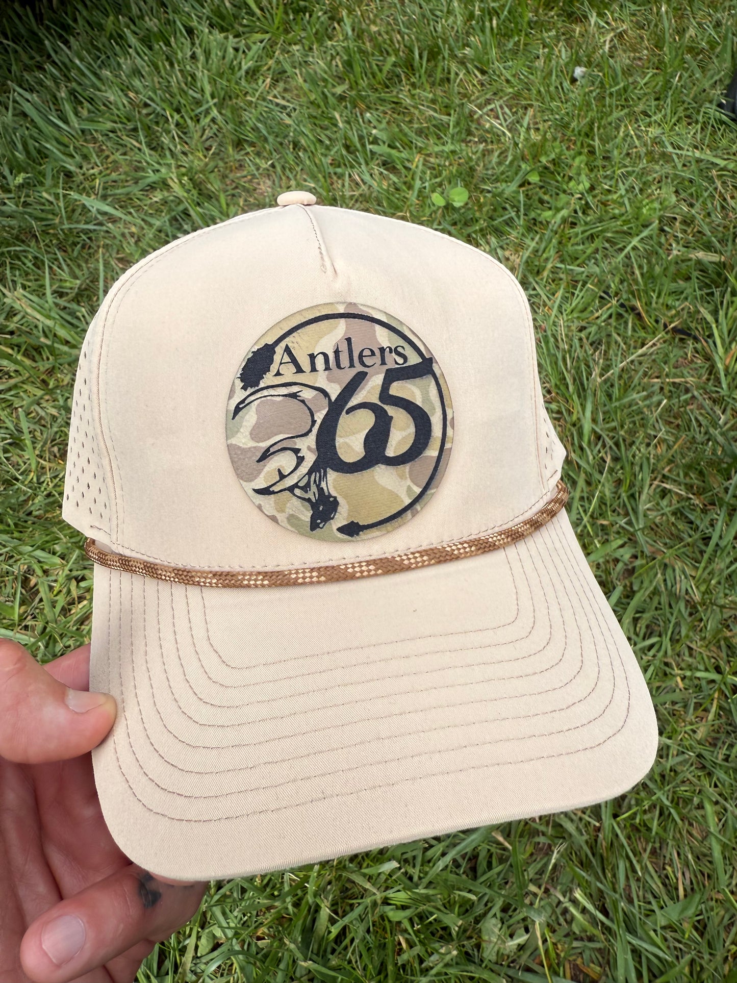 Tan Performance Golf Rope  hat w/ OG Camo Antlers patch