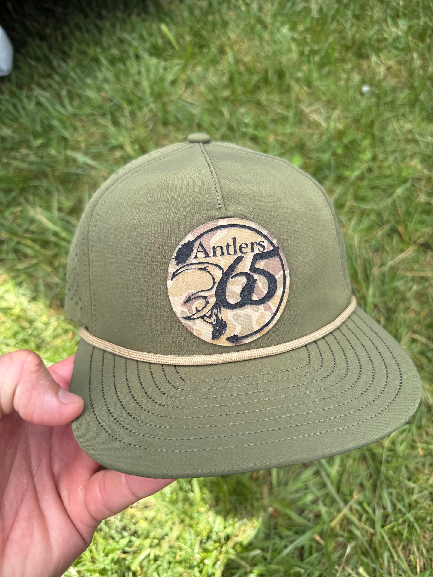 Olive Green Performance Golf Rope hat w/ OG Camo Antlers patch